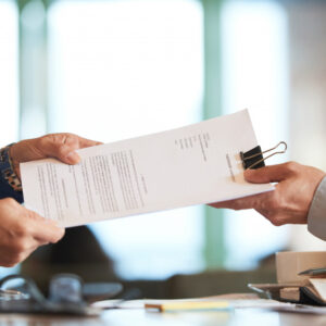 closeup-hands-passing-contract-unrecognizable-businessman